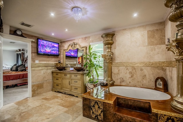 2019 Vanamen Ct, Conroe, TX 77304 - full bath with a bath, tile walls, ornamental molding, stone finish flooring, and vanity