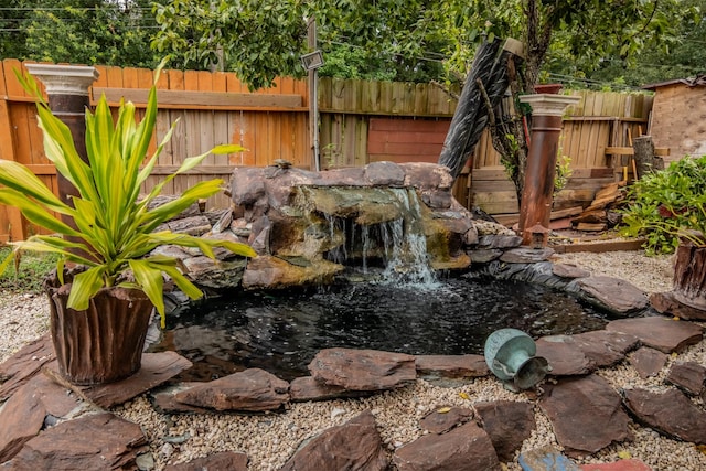 2019 Vanamen Ct, Conroe, TX 77304 - view of yard with a garden pond