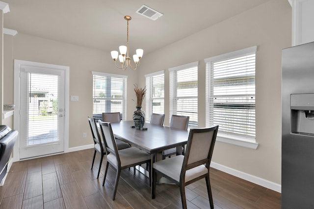 3604 Magnolia Crest Ln, Spring, TX 77386 - dining room with dark wood-style floors and a chandelier