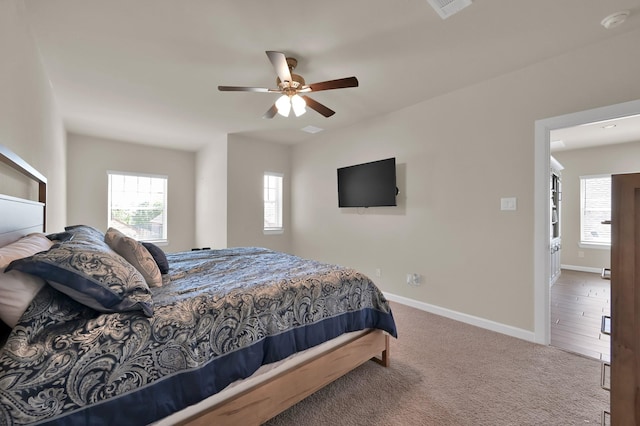 3604 Magnolia Crest Ln, Spring, TX 77386 - carpeted bedroom with baseboards and a ceiling fan