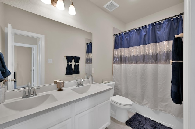 3604 Magnolia Crest Ln, Spring, TX 77386 - full bath featuring double vanity, shower / bath combo with shower curtain, and tile patterned floors