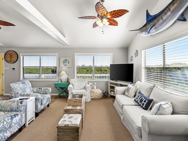 4039 San Jacinto Dr, Galveston, TX 77554 - living room with ceiling fan, lofted ceiling, and wood finished floors