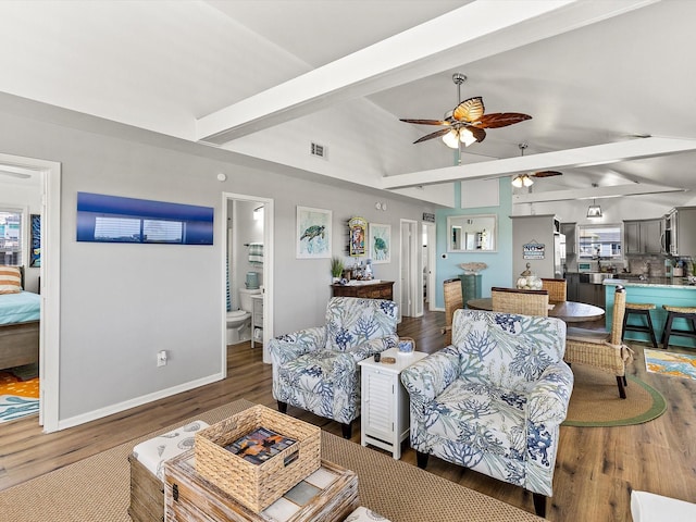4039 San Jacinto Dr, Galveston, TX 77554 - living area with ceiling fan and wood finished floors
