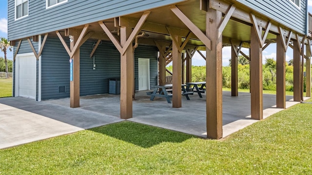 4039 San Jacinto Dr, Galveston, TX 77554 - view of community featuring a garage and a lawn