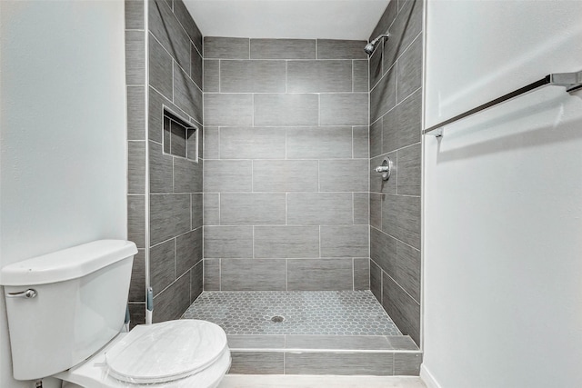 408 Commanche Rd, Conroe, TX 77316 - bathroom with toilet and tiled shower
