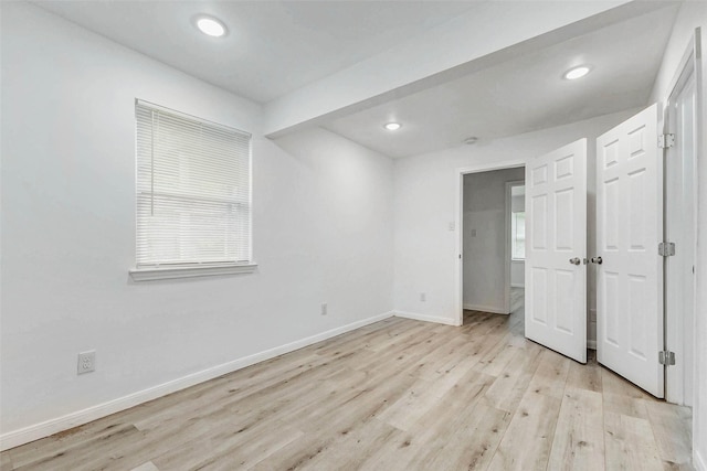 408 Commanche Rd, Conroe, TX 77316 - unfurnished bedroom featuring light wood-style floors and recessed lighting