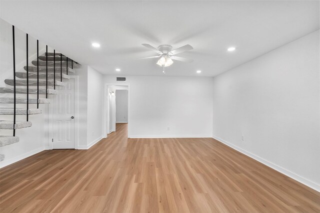 8124 Fondren Rd Unit 8124, Houston, TX 77074 - unfurnished living room featuring ceiling fan, light wood-style floors, recessed lighting, and stairs
