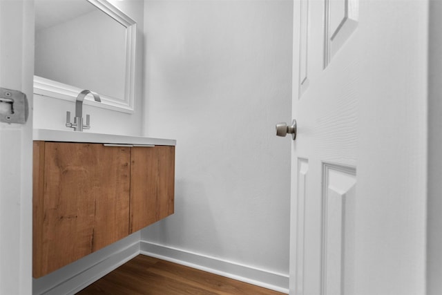 8124 Fondren Rd Unit 8124, Houston, TX 77074 - bathroom with wood finished floors and vanity