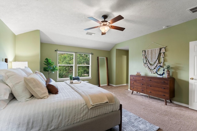 28210 Slatestone Ln, Spring, TX 77386 - bedroom featuring carpet floors, a ceiling fan, a textured ceiling, and vaulted ceiling