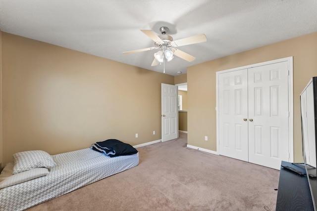 28210 Slatestone Ln, Spring, TX 77386 - unfurnished bedroom with carpet floors, a closet, and ceiling fan