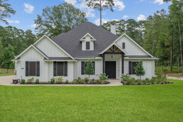 206 Rim Rock Rd, Huntsville, TX 77340 - modern farmhouse with roof with shingles, board and batten siding, a chimney, and a front yard