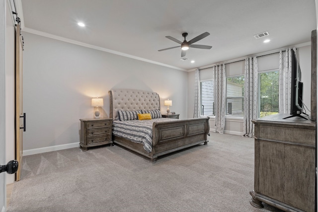 206 Rim Rock Rd, Huntsville, TX 77340 - bedroom with light colored carpet, ornamental molding, recessed lighting, ceiling fan, and a barn door