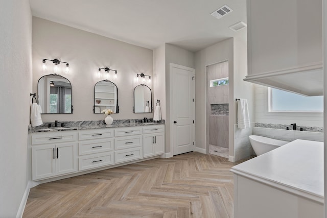 206 Rim Rock Rd, Huntsville, TX 77340 - full bath with double vanity, walk in shower, and a freestanding tub