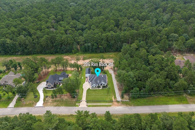 206 Rim Rock Rd, Huntsville, TX 77340 - drone / aerial view of a heavily wooded area
