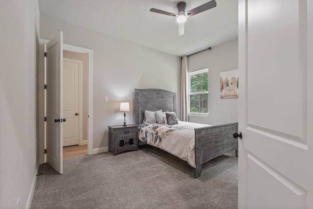206 Rim Rock Rd, Huntsville, TX 77340 - bedroom with carpet flooring and ceiling fan