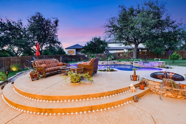 2728 Long Lasso Pass, Leander, TX 78641 - view of pool featuring a patio, a fenced backyard, and an outdoor living space with a fire pit