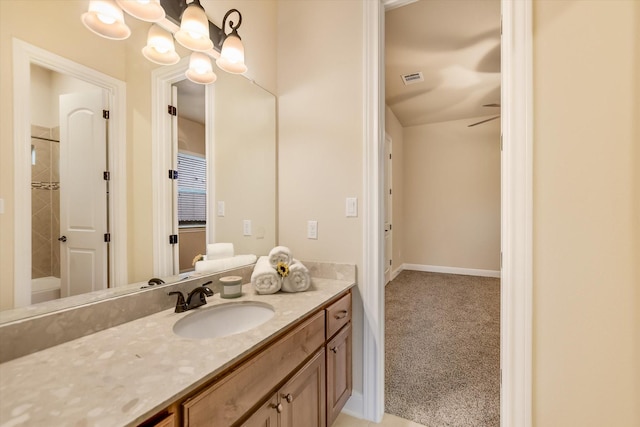 2728 Long Lasso Pass, Leander, TX 78641 - bathroom with vanity, a shower, and a chandelier