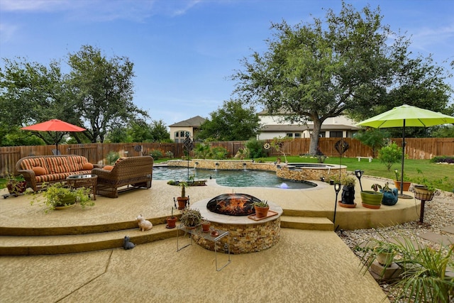 2728 Long Lasso Pass, Leander, TX 78641 - view of swimming pool featuring a patio, a fenced backyard, and an outdoor living space with a fire pit