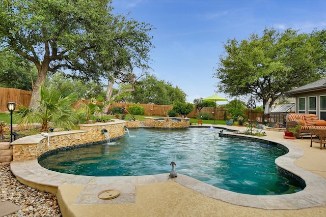 2728 Long Lasso Pass, Leander, TX 78641 - view of pool with a fenced backyard, a patio area, and a pool with connected hot tub