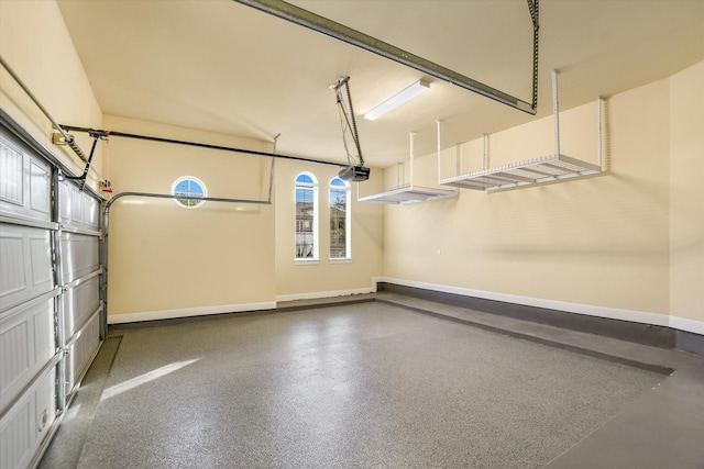 2728 Long Lasso Pass, Leander, TX 78641 - garage with baseboards and a garage door opener