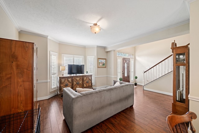 16447 Flint Run Way, Sugar Land, TX 77498 - living area featuring plenty of natural light, stairway, ornamental molding, dark wood-type flooring, and a textured ceiling