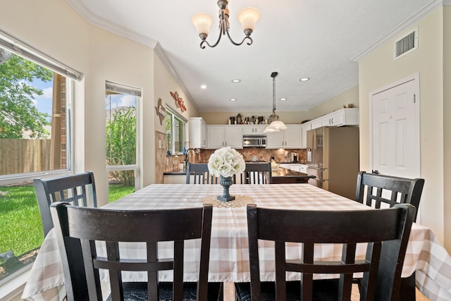 16447 Flint Run Way, Sugar Land, TX 77498 - dining space featuring healthy amount of natural light, crown molding, a chandelier, and recessed lighting