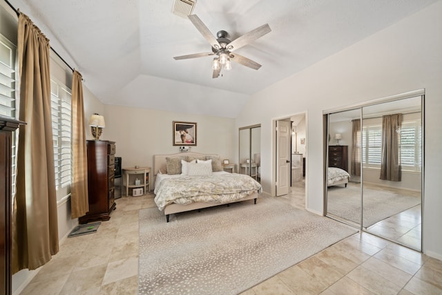 16447 Flint Run Way, Sugar Land, TX 77498 - bedroom featuring multiple closets, light tile patterned floors, lofted ceiling, and ceiling fan