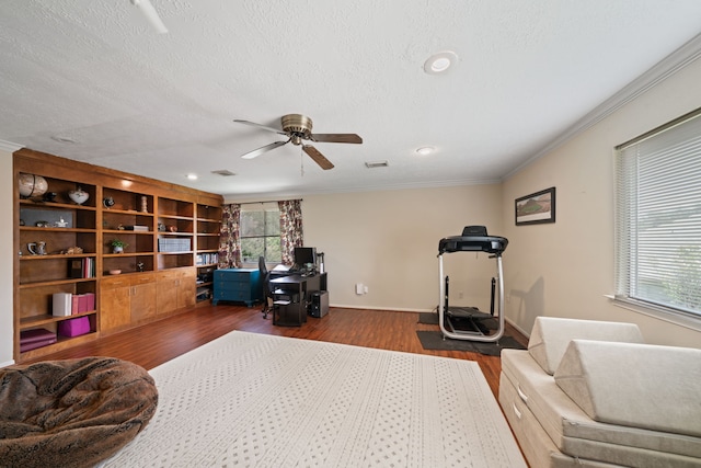 16447 Flint Run Way, Sugar Land, TX 77498 - bedroom with wood finished floors, ornamental molding, an office area, a textured ceiling, and recessed lighting