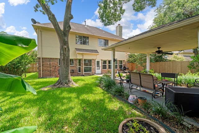 16447 Flint Run Way, Sugar Land, TX 77498 - rear view of house with a patio area and brick siding