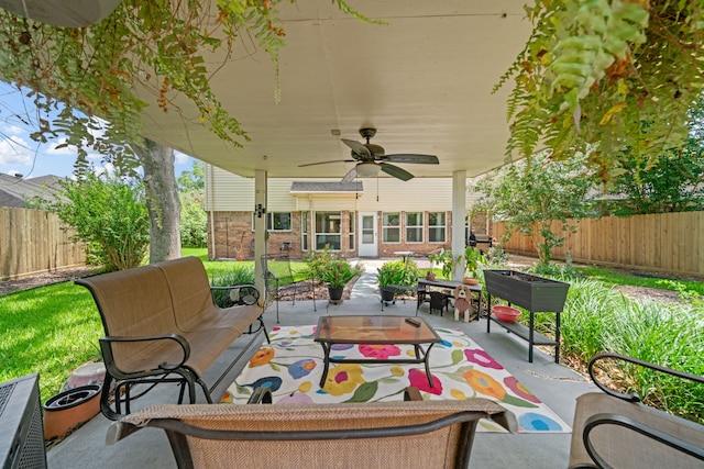 16447 Flint Run Way, Sugar Land, TX 77498 - fenced backyard with a patio, a ceiling fan, an outdoor hangout area, and outdoor dining space