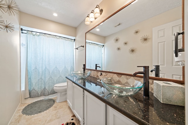 16447 Flint Run Way, Sugar Land, TX 77498 - bathroom with double vanity, shower / tub combo, and recessed lighting
