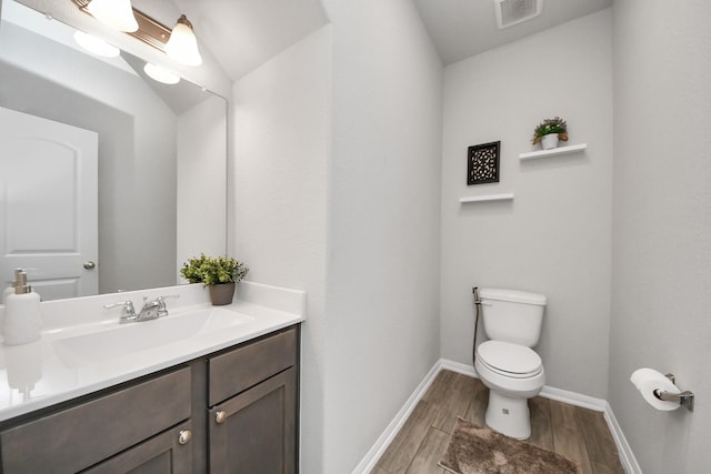 5206 Wyatt James Ln, Brookshire, TX 77423 - half bathroom with vanity and wood finished floors