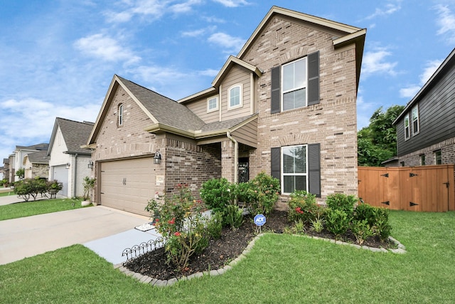 5206 Wyatt James Ln, Brookshire, TX 77423 - view of front facade with brick siding, driveway, a shingled roof, and an attached garage