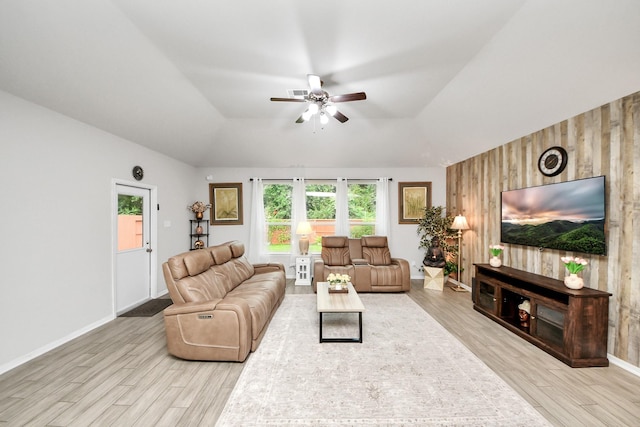 5206 Wyatt James Ln, Brookshire, TX 77423 - living area featuring wood finished floors, a ceiling fan, lofted ceiling, and wooden walls