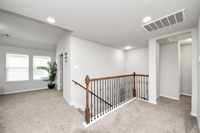 5206 Wyatt James Ln, Brookshire, TX 77423 - hallway featuring carpet, attic access, an upstairs landing, and recessed lighting
