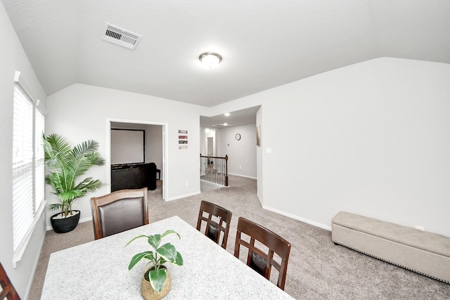 5206 Wyatt James Ln, Brookshire, TX 77423 - dining area featuring vaulted ceiling and carpet floors