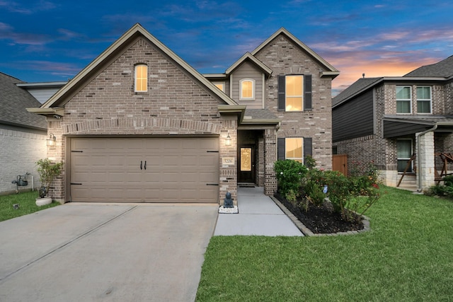 5206 Wyatt James Ln, Brookshire, TX 77423 - view of front of property with driveway, a lawn, and brick siding