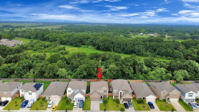 5206 Wyatt James Ln, Brookshire, TX 77423 - aerial perspective of suburban area with a heavily wooded area