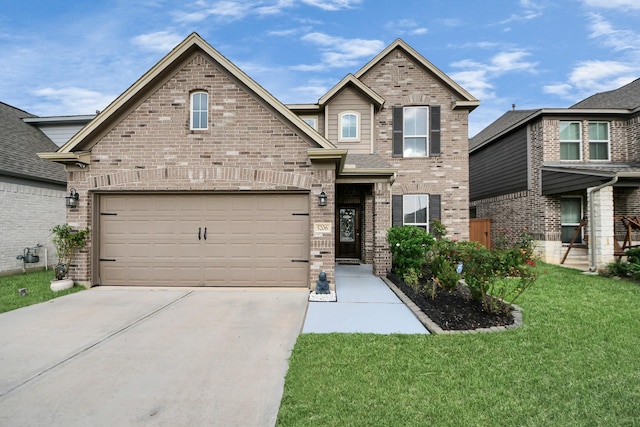 5206 Wyatt James Ln, Brookshire, TX 77423 - view of front of property featuring concrete driveway, a front yard, and brick siding