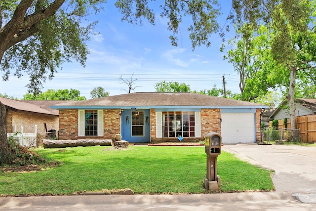 15050 Groveshire St, Channelview, TX 77530 - ranch-style home with concrete driveway, an attached garage, and brick siding