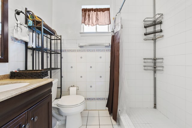 15050 Groveshire St, Channelview, TX 77530 - bathroom with tile walls, a tile shower, and vanity