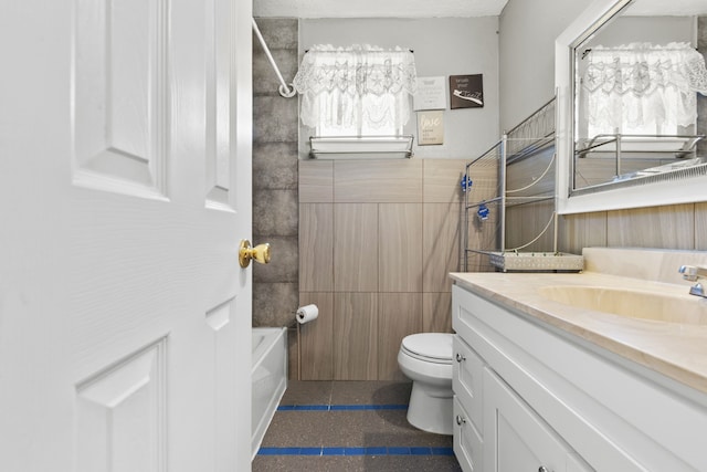 15050 Groveshire St, Channelview, TX 77530 - bathroom with vanity, tile walls, shower / bath combination, and tile patterned floors