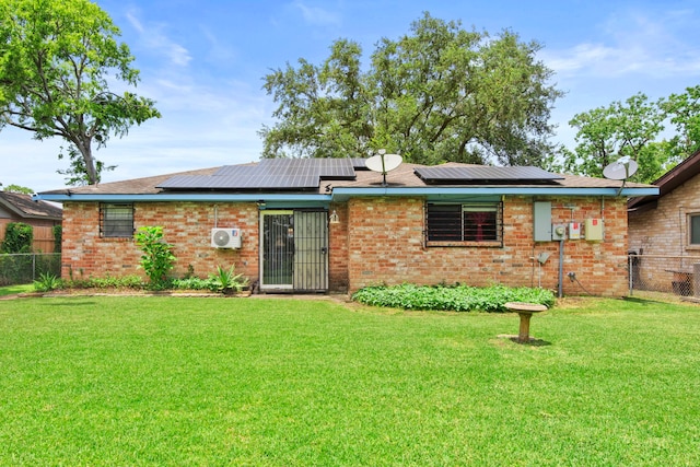 15050 Groveshire St, Channelview, TX 77530 - back of property featuring brick siding and solar panels