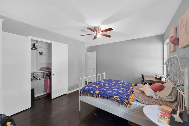 7403 Theisswood Rd, Spring, TX 77379 - bedroom featuring wood finished floors, a closet, and a ceiling fan