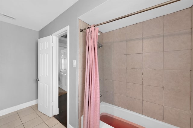 7403 Theisswood Rd, Spring, TX 77379 - bathroom with tile patterned flooring and shower / tub combo with curtain
