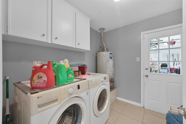 7403 Theisswood Rd, Spring, TX 77379 - laundry area with gas water heater, washer and dryer, cabinet space, and light tile patterned floors