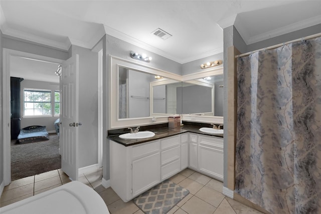 7403 Theisswood Rd, Spring, TX 77379 - ensuite bathroom with crown molding, double vanity, tile patterned floors, and a shower with shower curtain