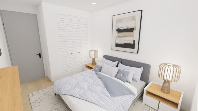 1316 W Willis St, Alvin, TX 77511 - bedroom featuring a closet, recessed lighting, and wood finished floors