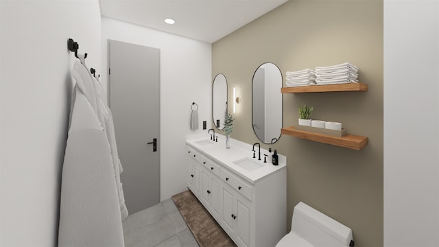 1316 W Willis St, Alvin, TX 77511 - bathroom featuring double vanity, recessed lighting, and tile patterned floors