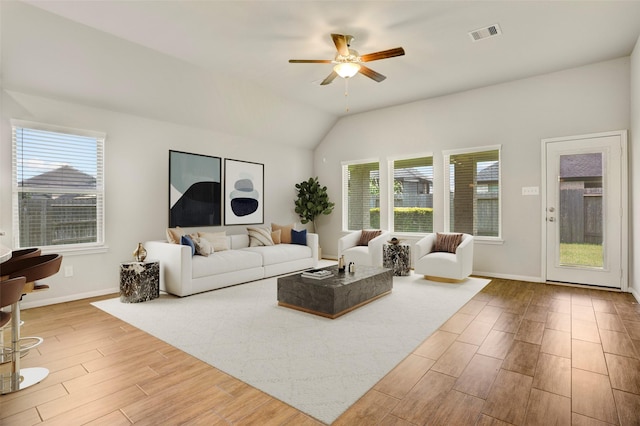8426 Kari Bend Cir, Richmond, TX 77407 - living area with a ceiling fan, wood finished floors, and lofted ceiling